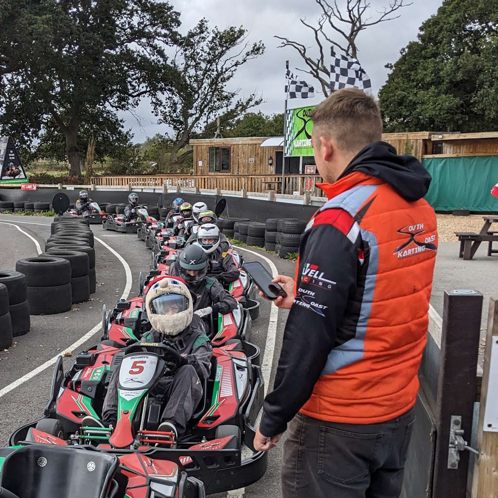 Marshal supervising pit lane workflow